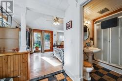 Main floor bedroom with backyard view -