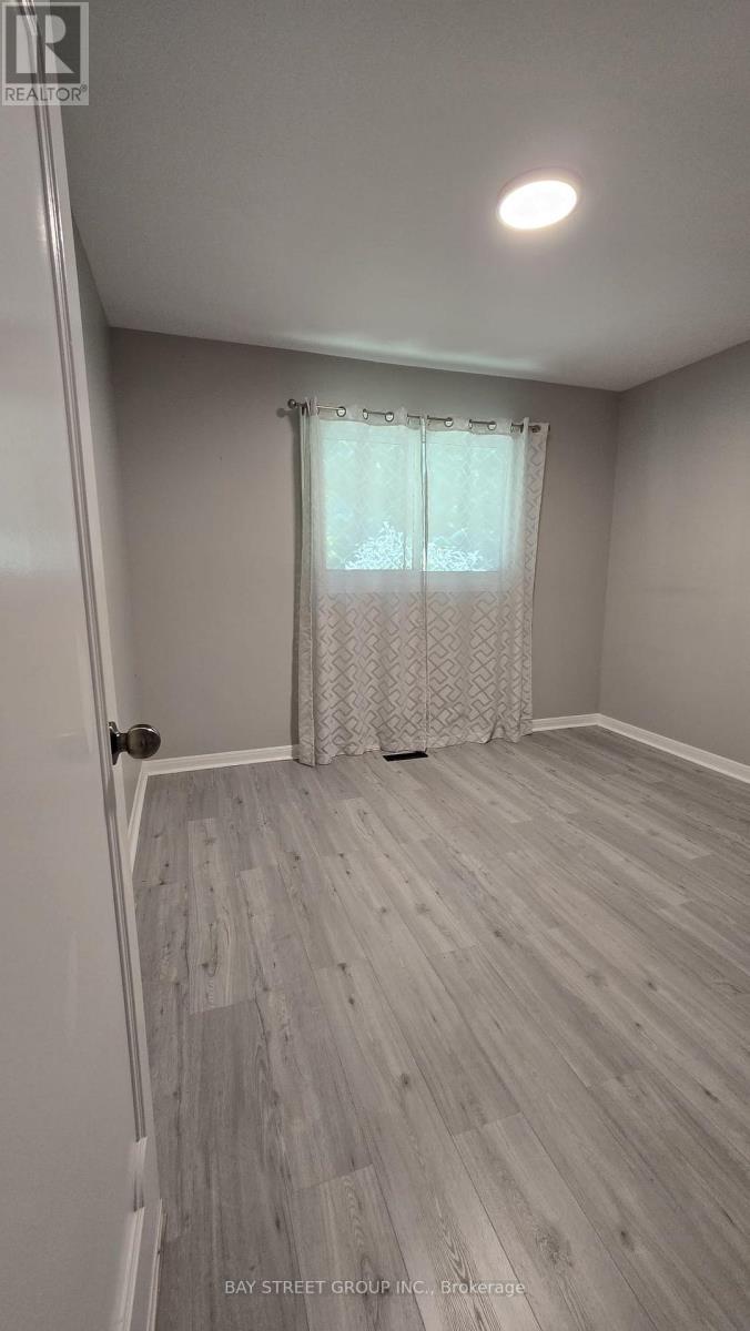 Bedroom 2 - 49 Maplewood Drive, Amaranth, ON - Indoor Photo Showing Other Room