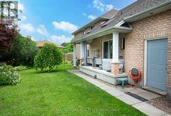 Side yard and Covered Porch -