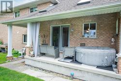 Side yard and Covered Porch -
