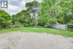 View of yard featuring view of wooded area -