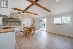 Walkout to deck overlooking lake. -