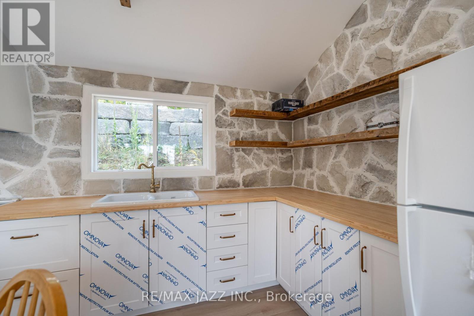 Reclaimed barn board open shelves. - 348 Fire Rte 54, Havelock-Belmont-Methuen (Belmont-Methuen), ON - Indoor Photo Showing Kitchen With Double Sink