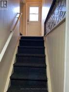 Side entrance to basement -