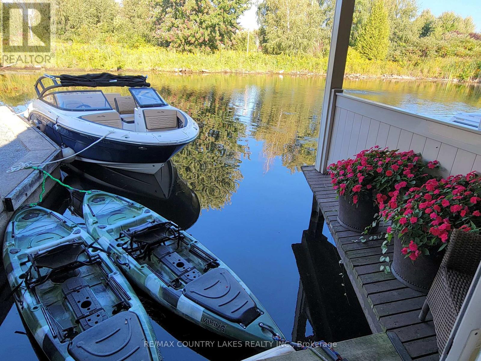 11 - 4 Paradise Boulevard, Ramara, ON - Outdoor With Body Of Water