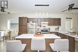 Spacious kitchen with centre island and s/s/ appl. -