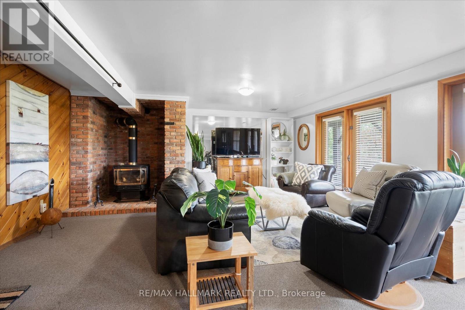 67 Telecom Road, Kawartha Lakes, ON - Indoor Photo Showing Living Room With Fireplace