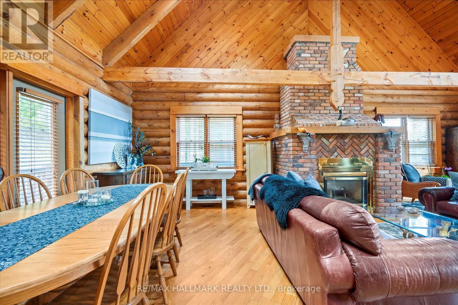 67 Telecom Road, Kawartha Lakes, ON - Indoor Photo Showing Dining Room With Fireplace