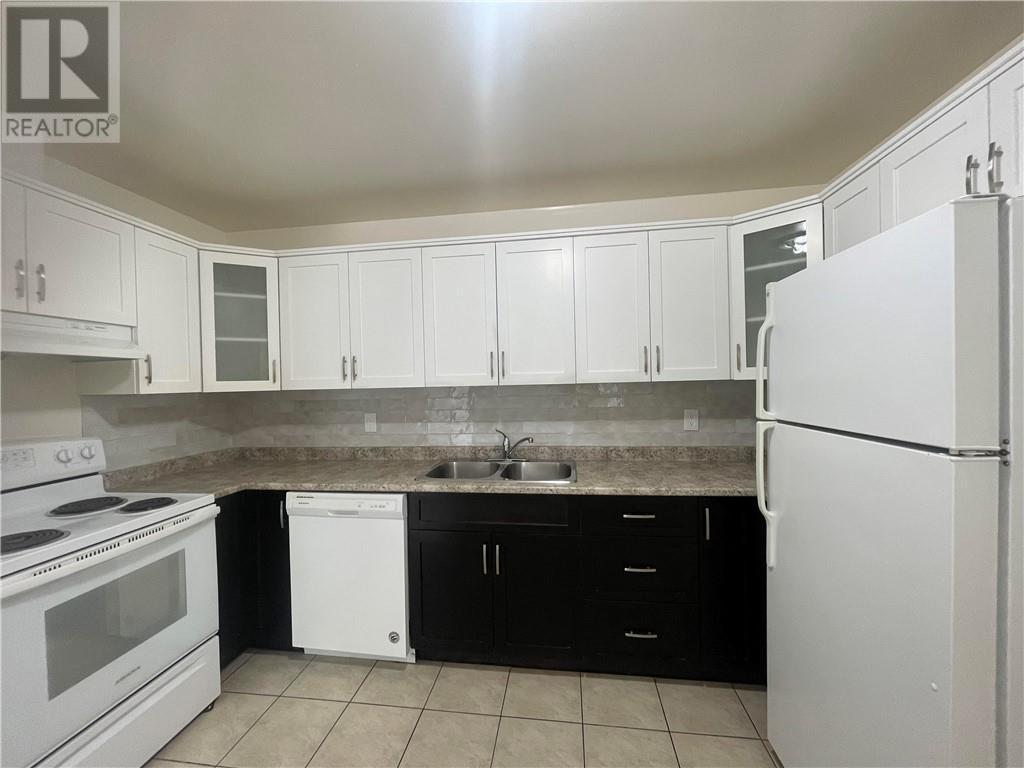 414 Westmount Avenue Unit# E15, Sudbury, ON - Indoor Photo Showing Kitchen With Double Sink