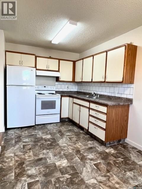 2 34 Central Avenue S, Swift Current, SK - Indoor Photo Showing Kitchen