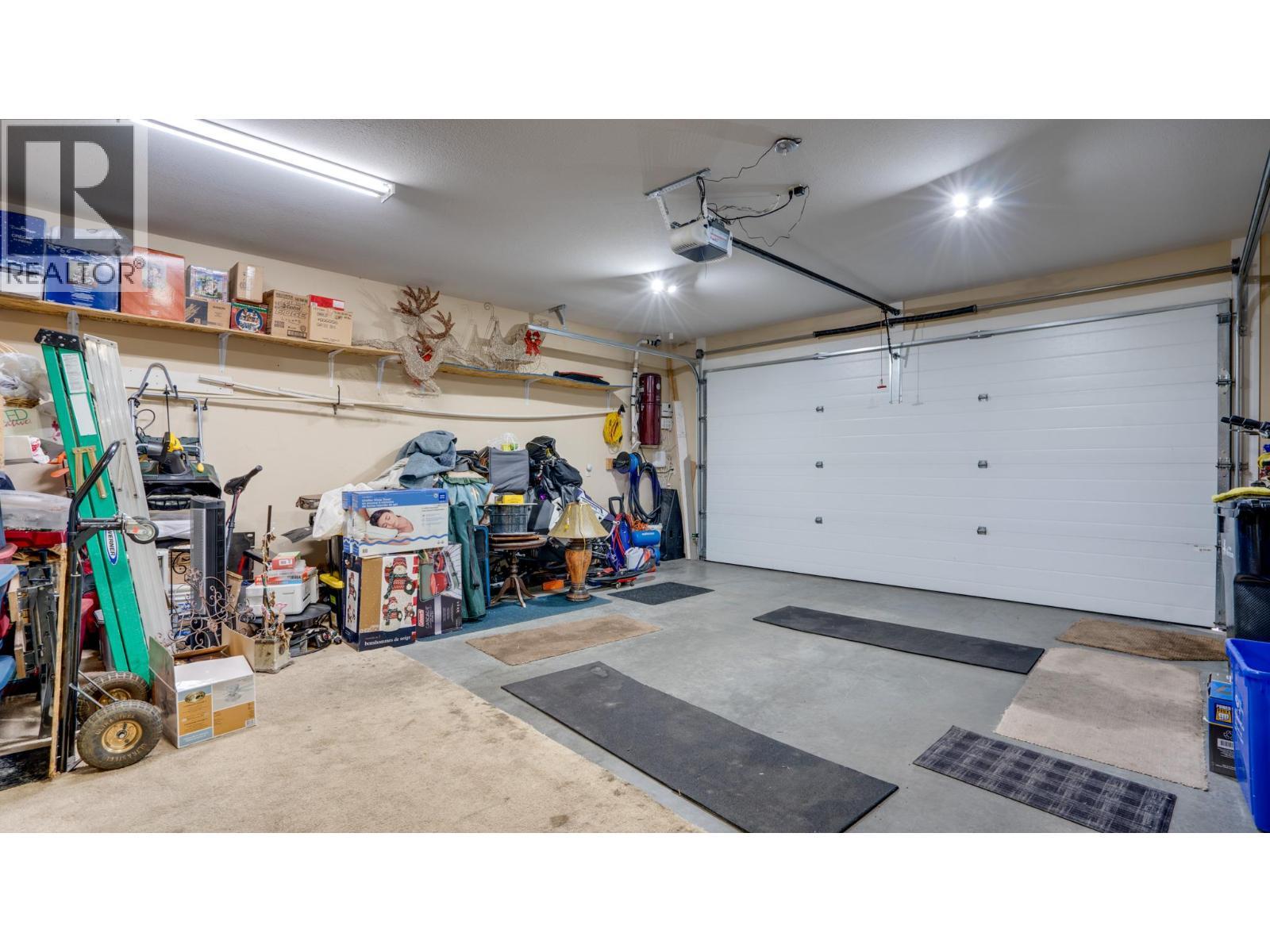 Garage - 1404 Copper Mountain Court Unit# 13, Vernon, BC - Indoor Photo Showing Garage