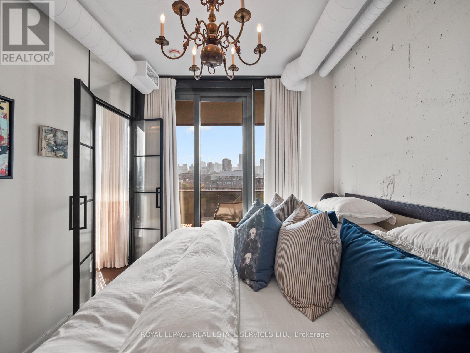 904 - 21 Lawren Harris Square, Toronto, ON - Indoor Photo Showing Bedroom