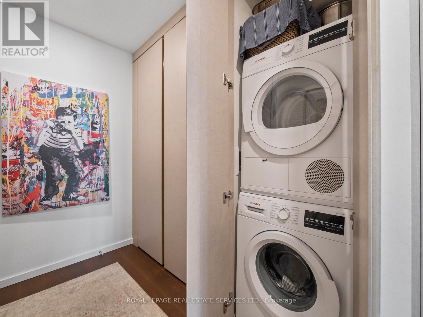 904 - 21 Lawren Harris Square, Toronto, ON - Indoor Photo Showing Laundry Room