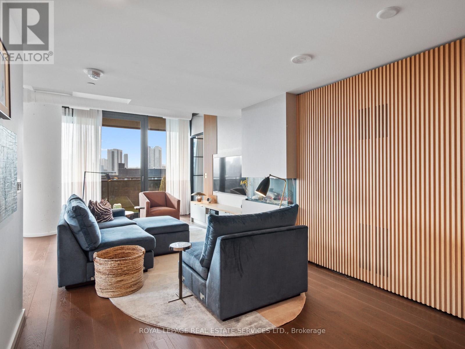 904 - 21 Lawren Harris Square, Toronto, ON - Indoor Photo Showing Living Room