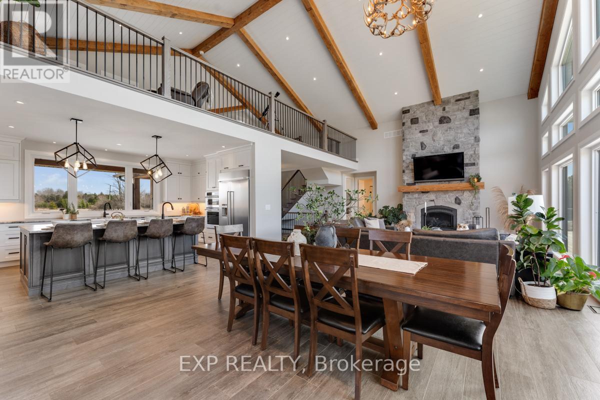 1023 Concession Road 8 Road, Brock, ON - Indoor Photo Showing Dining Room With Fireplace