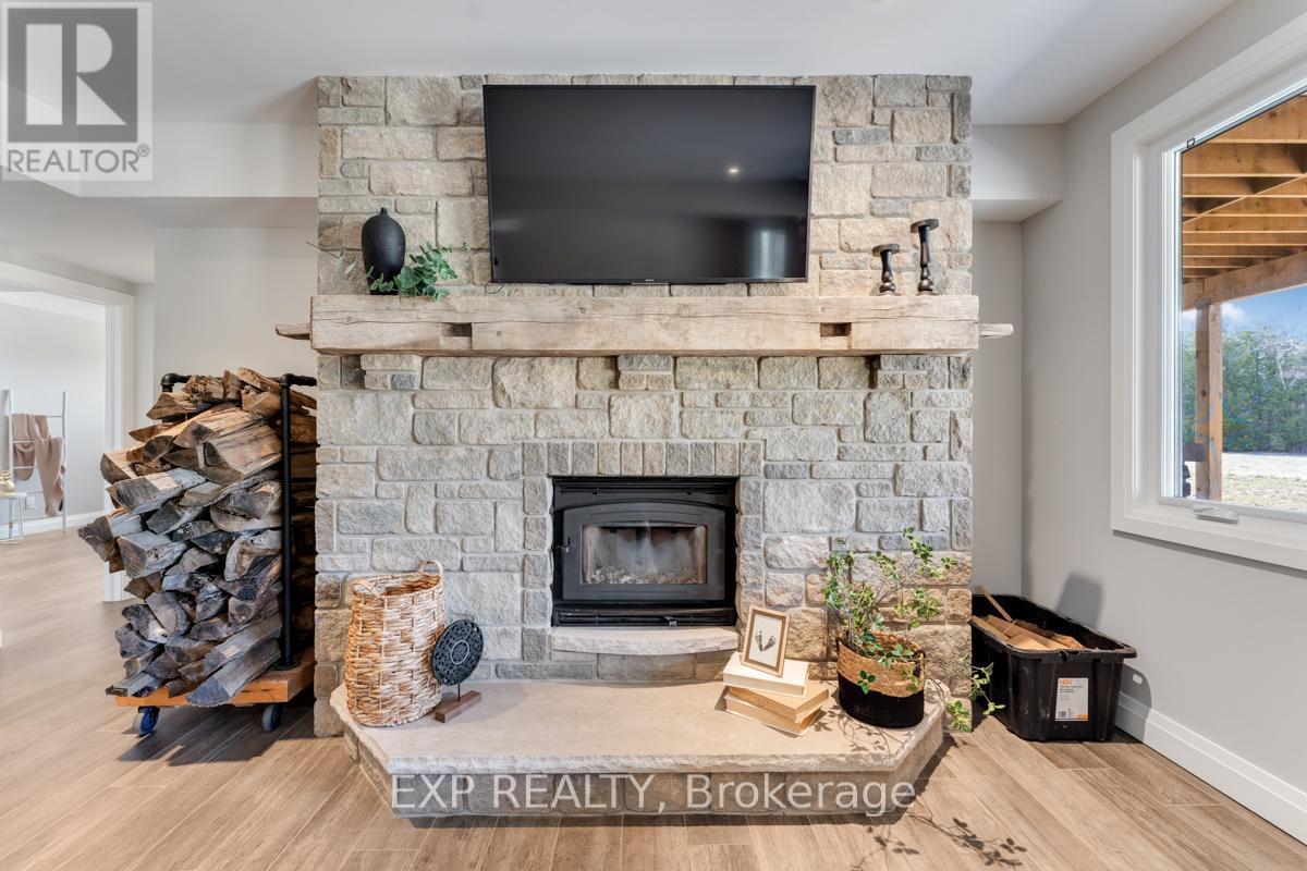 Wood Burning Fireplace - 1023 Concession Road 8 Road, Brock, ON - Indoor Photo Showing Living Room With Fireplace