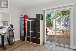 BACK DEN OR OFFICE WITH WALK-OUT -