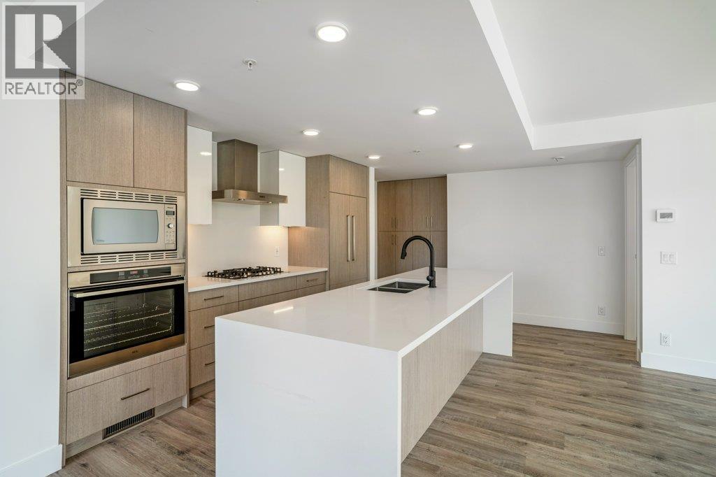 1588 Ellis Street Unit# 609, Kelowna, BC - Indoor Photo Showing Kitchen With Double Sink With Upgraded Kitchen