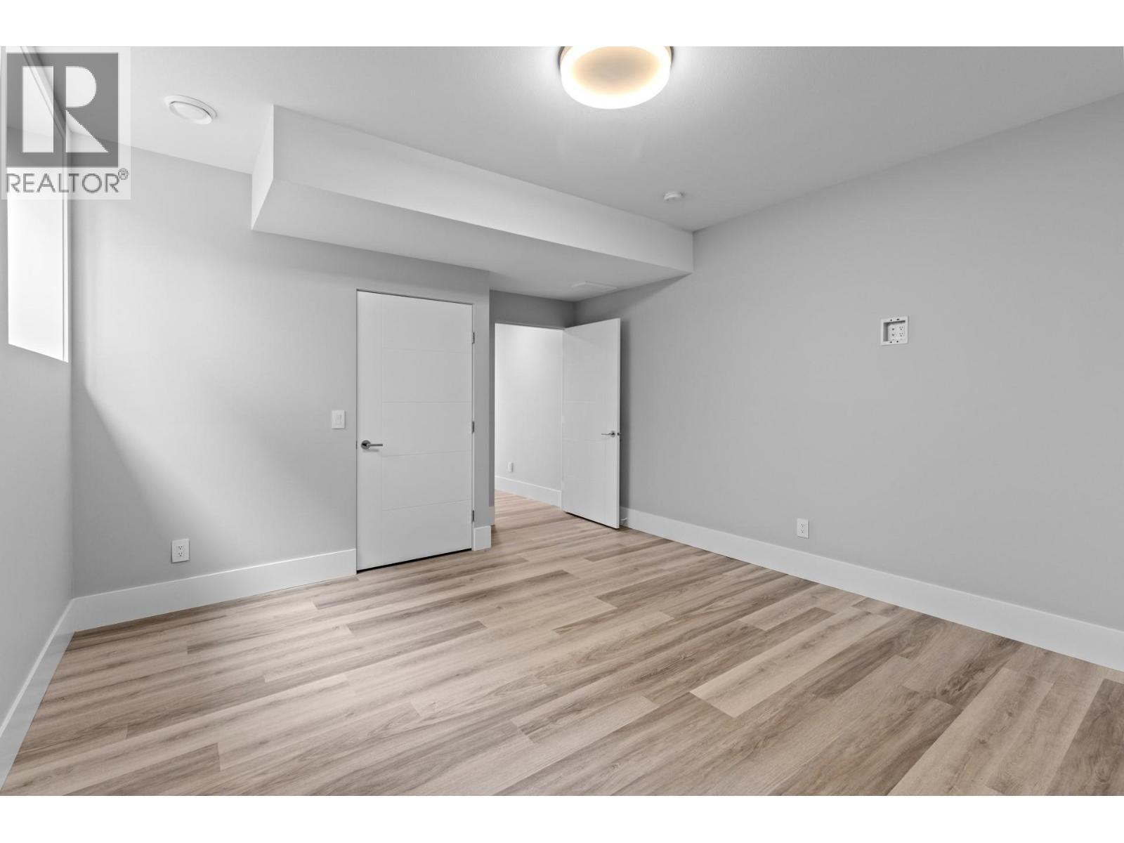 1240 Ponds Avenue, Kelowna, BC - Indoor Photo Showing Other Room