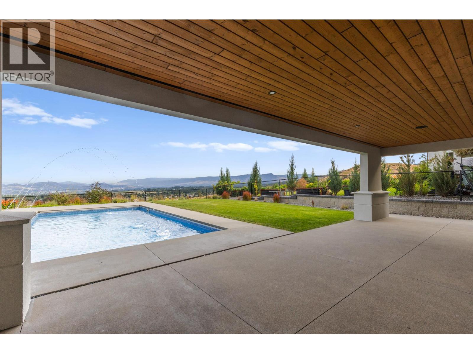 1240 Ponds Avenue, Kelowna, BC - Outdoor With In Ground Pool With Deck Patio Veranda