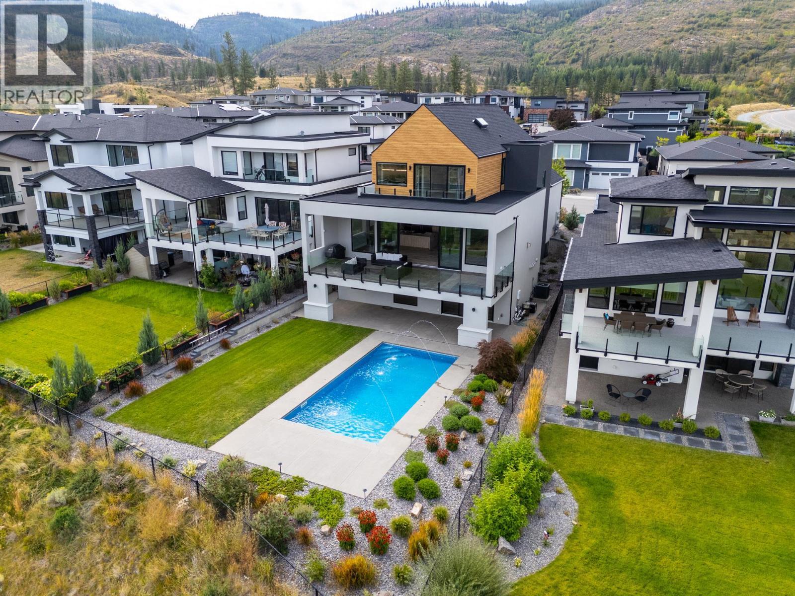1240 Ponds Avenue, Kelowna, BC - Outdoor With In Ground Pool