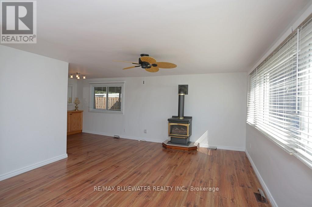 25 Maple Grove Court E, South Huron (Stephen), ON - Indoor Photo Showing Other Room With Fireplace