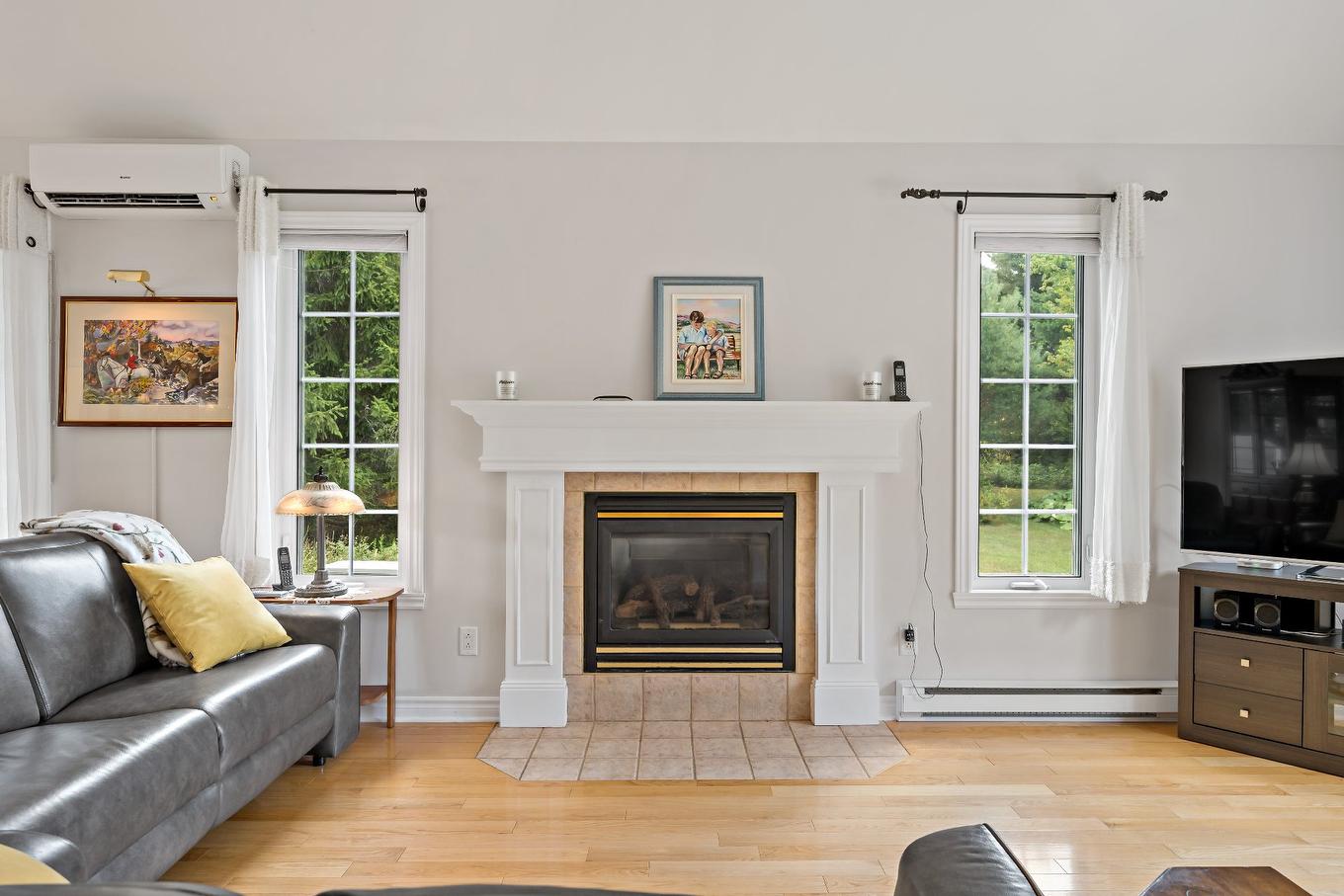 Living room - 535 Rue Émond, Mont-Tremblant, QC - Indoor Photo Showing Living Room With Fireplace