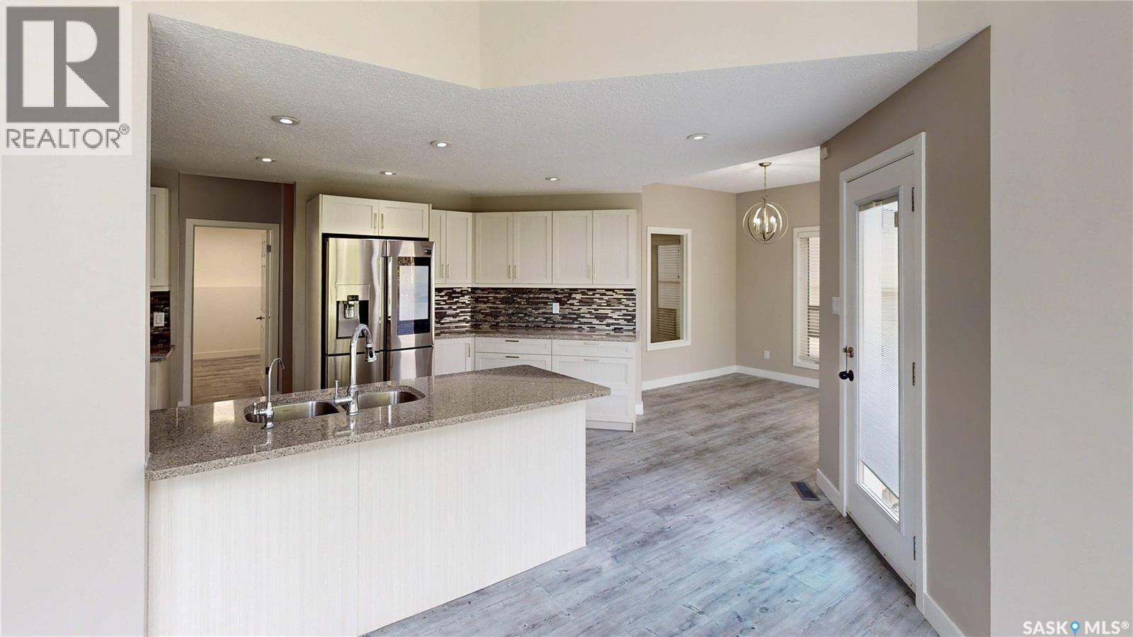 5006 Wascana Vista Court, Regina, SK - Indoor Photo Showing Kitchen With Double Sink