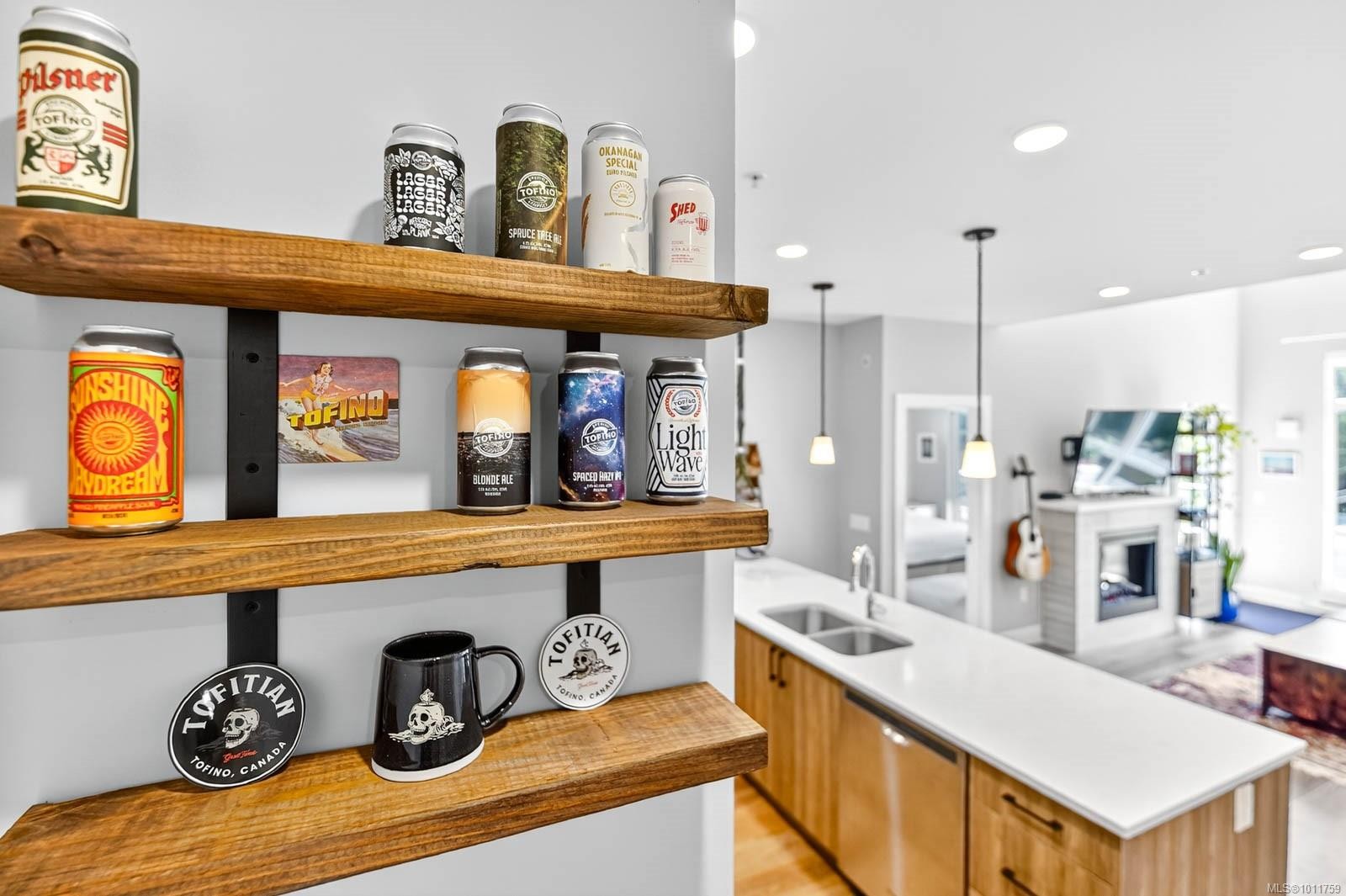 302-700 Yew Wood Rd, Tofino, BC - Indoor Photo Showing Kitchen With Fireplace With Double Sink