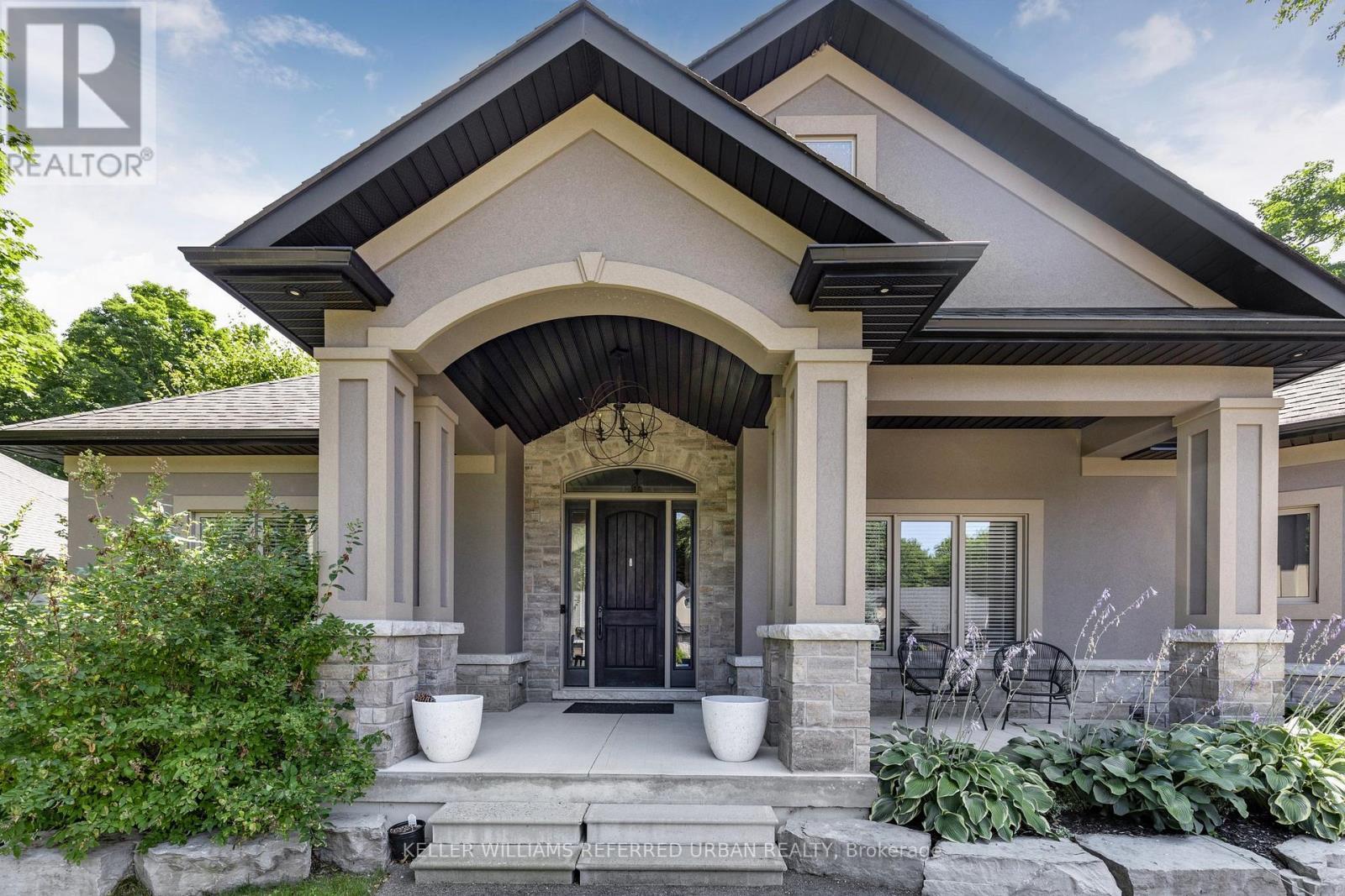 25 Heron Boulevard, Springwater, ON - Outdoor With Deck Patio Veranda With Facade