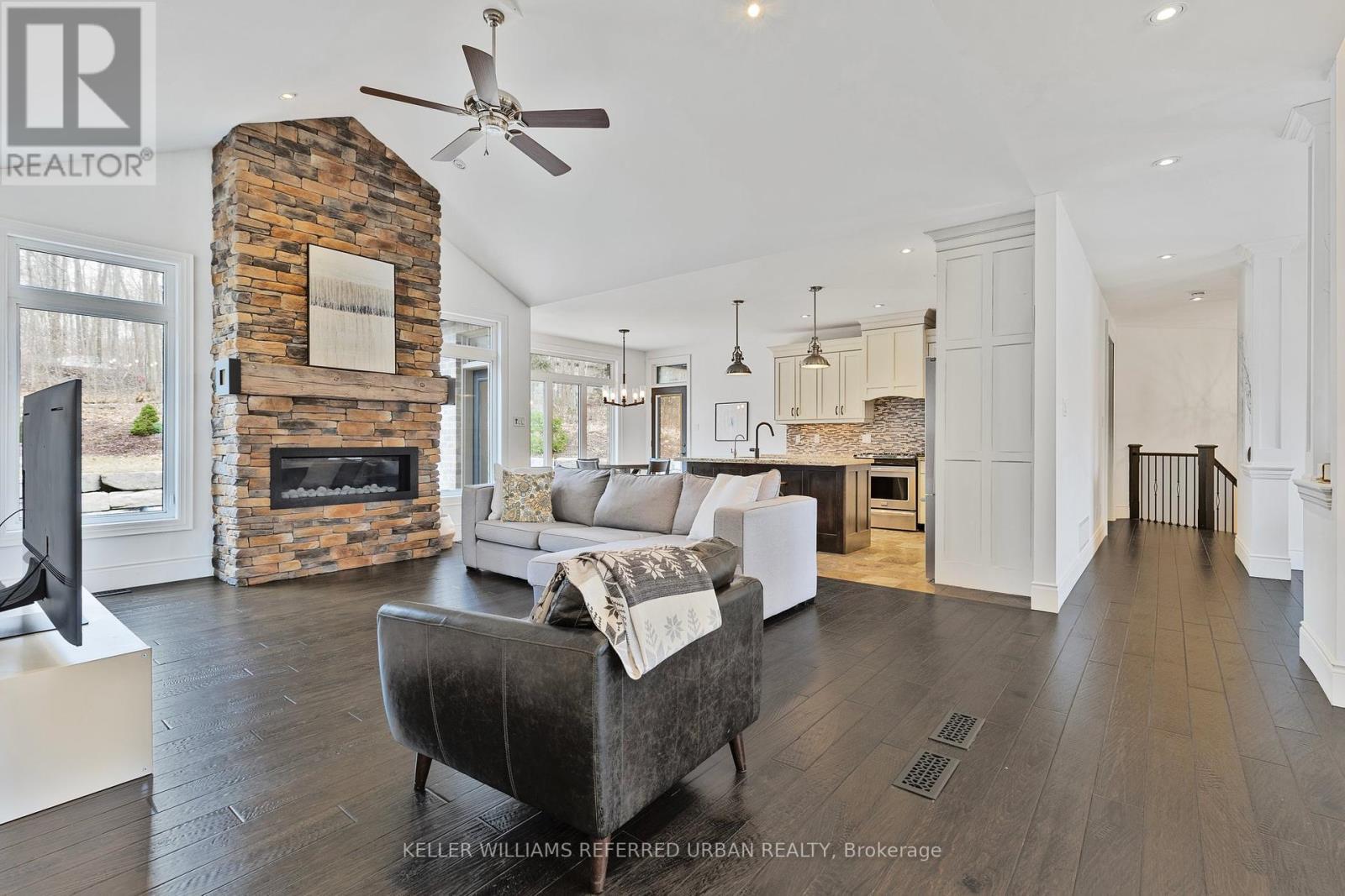25 Heron Boulevard, Springwater, ON - Indoor Photo Showing Living Room With Fireplace