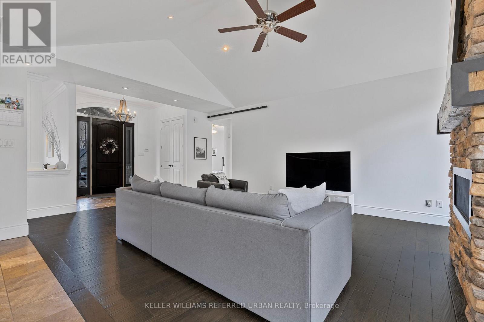 25 Heron Boulevard, Springwater, ON - Indoor Photo Showing Living Room With Fireplace