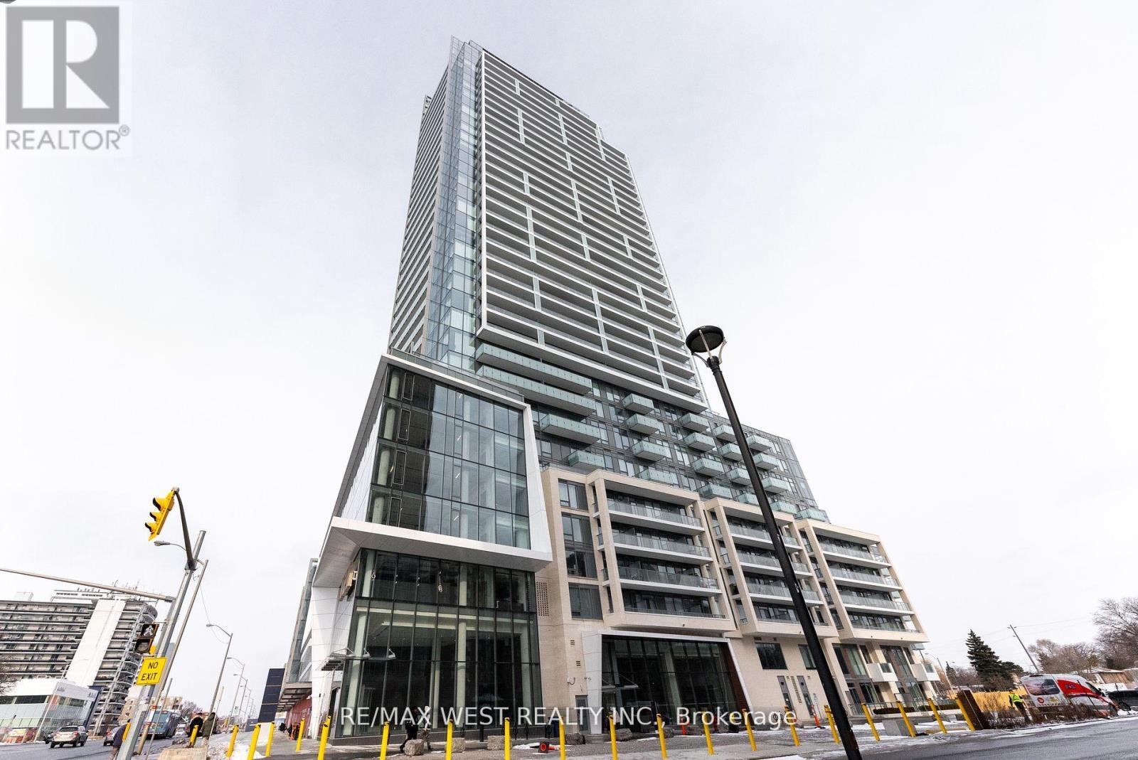 314 - 8 Olympic Garden, Toronto, ON - Outdoor With Facade