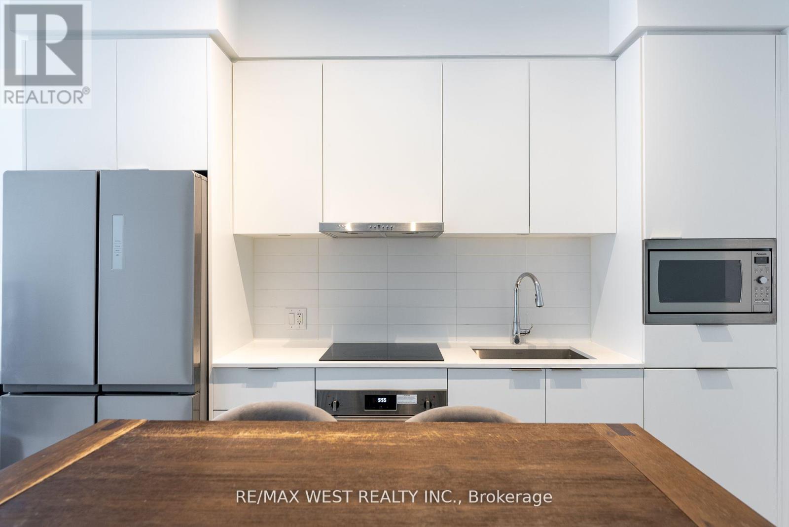 314 - 8 Olympic Garden, Toronto, ON - Indoor Photo Showing Kitchen
