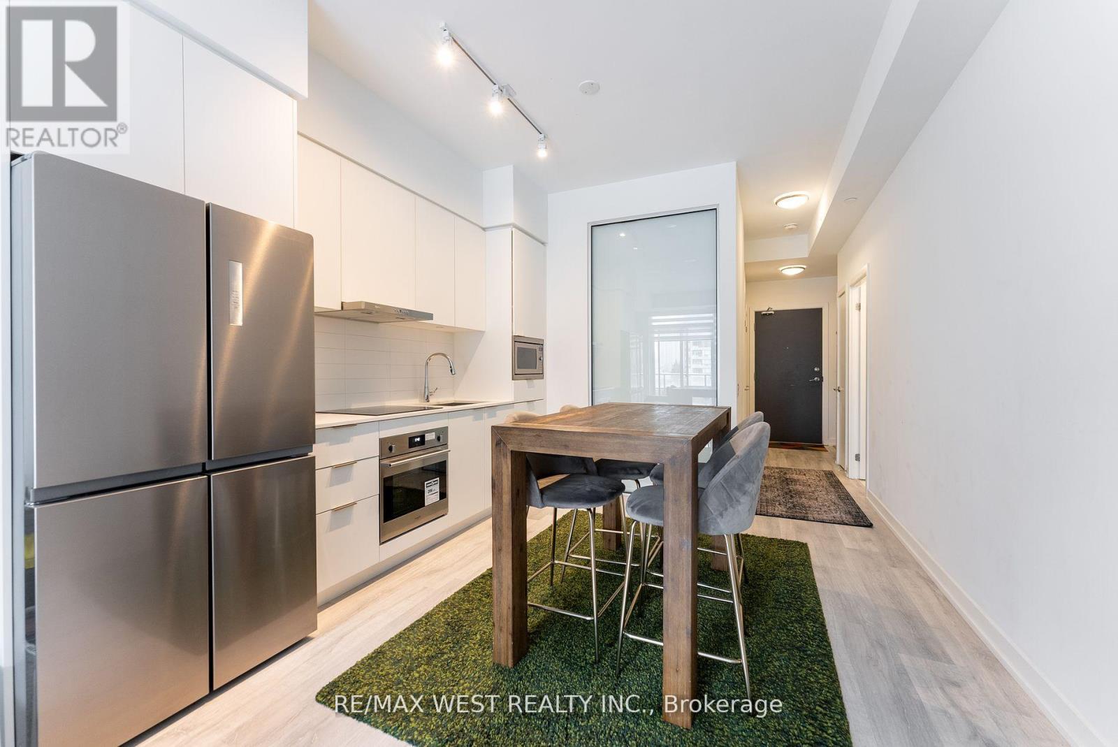 314 - 8 Olympic Garden, Toronto, ON - Indoor Photo Showing Kitchen With Stainless Steel Kitchen