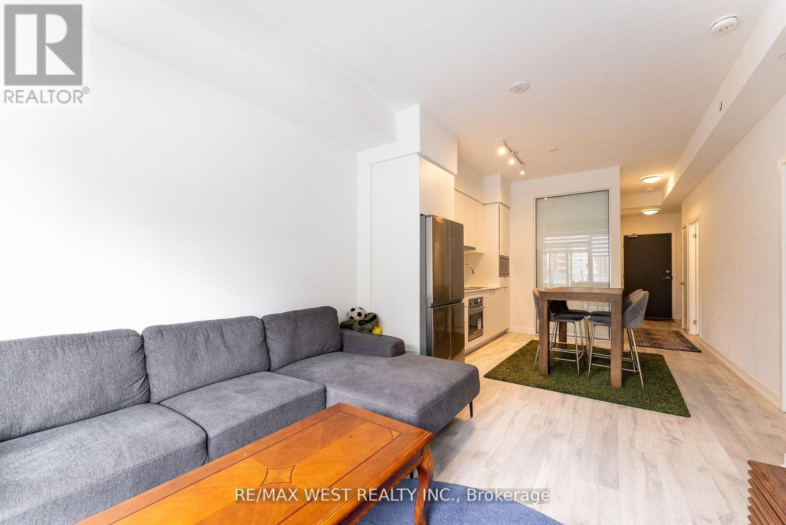 314 - 8 Olympic Garden, Toronto, ON - Indoor Photo Showing Living Room