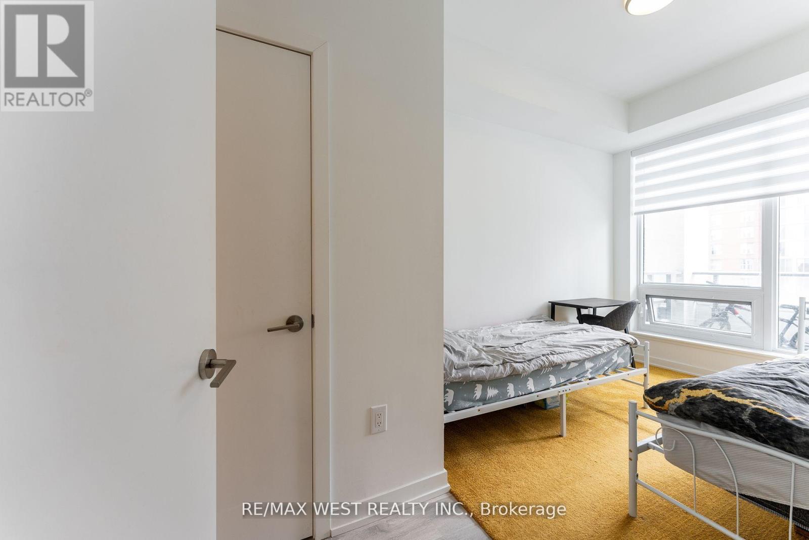 314 - 8 Olympic Garden, Toronto, ON - Indoor Photo Showing Bedroom