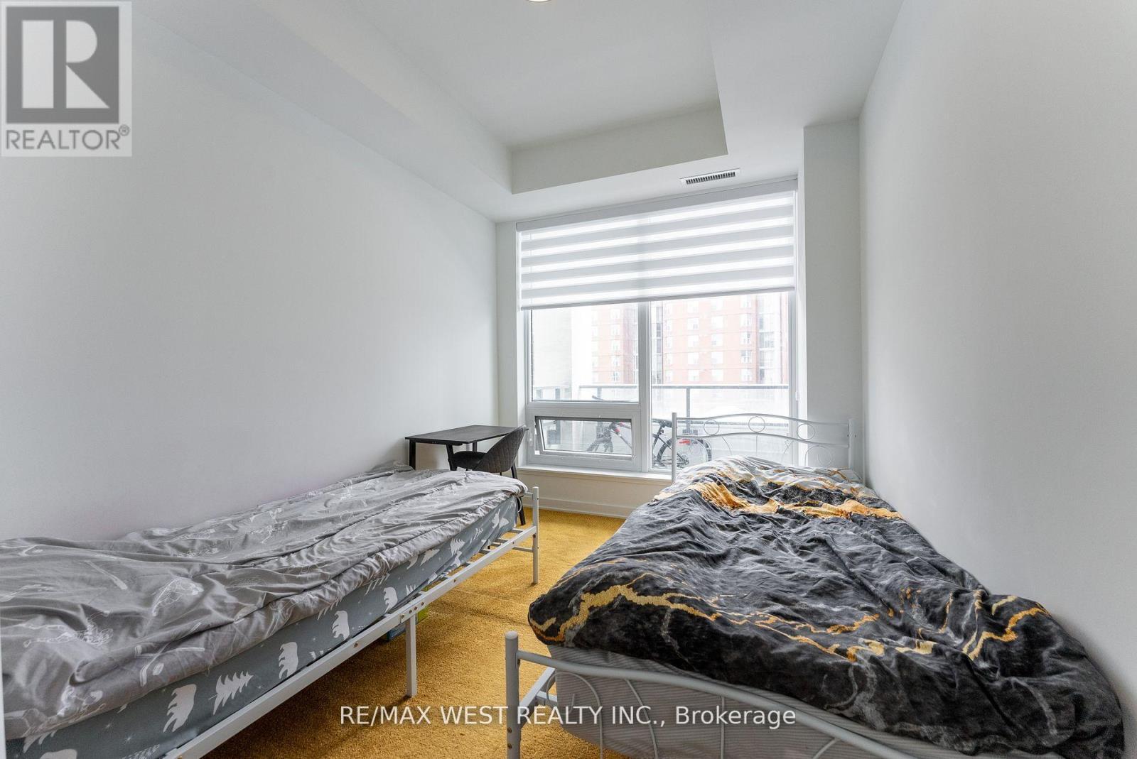 314 - 8 Olympic Garden, Toronto, ON - Indoor Photo Showing Bedroom