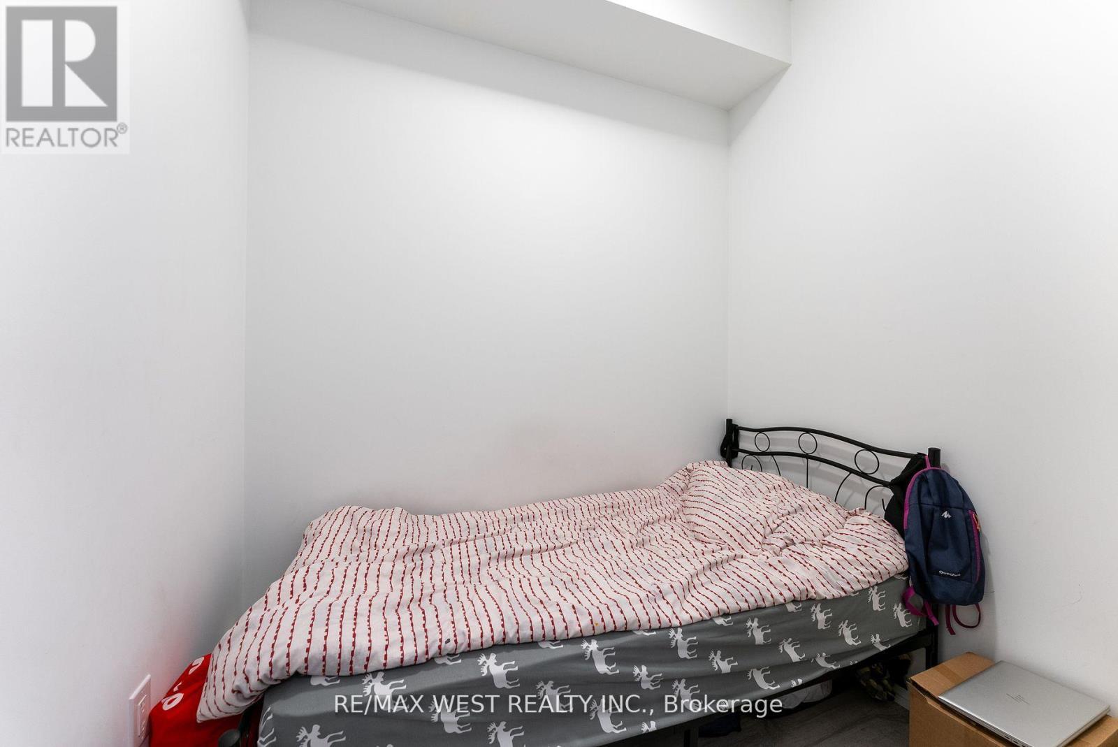 314 - 8 Olympic Garden, Toronto, ON - Indoor Photo Showing Bedroom