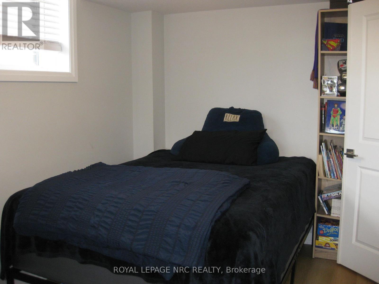 74 - 6705 Cropp Street, Niagara Falls (Morrison), ON - Indoor Photo Showing Bedroom