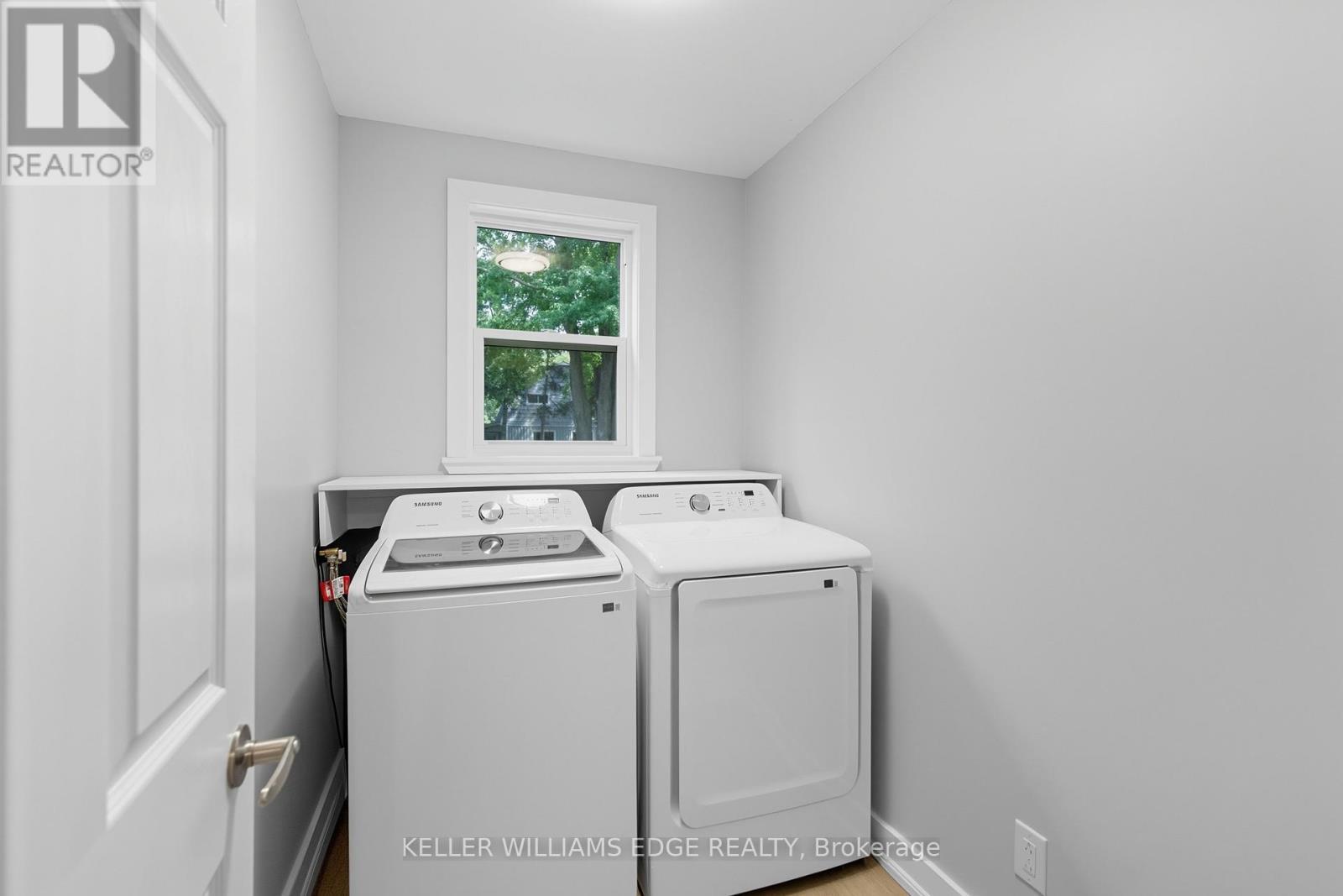 MAIN FLOOR LAUNDRY - 1402 Hwy 6, Hamilton, ON - Indoor Photo Showing Laundry Room
