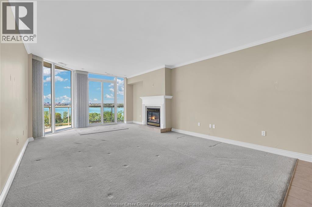 4955 Riverside Drive East Unit# 802, Windsor, ON - Indoor With Fireplace