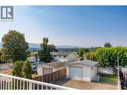 View of back yard with detached garage -