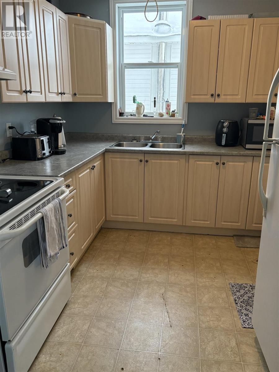 42-44 Aberdeen St, Chapleau, ON - Indoor Photo Showing Kitchen With Double Sink