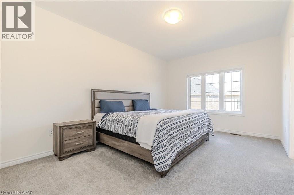 Carpeted bedroom featuring baseboards - 35 Hitchman Street, Paris, ON - Indoor Photo Showing Bedroom