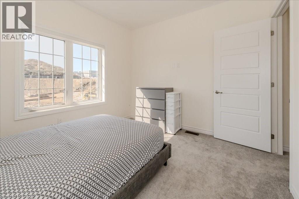 Bedroom featuring carpet flooring and baseboards - 35 Hitchman Street, Paris, ON - Indoor Photo Showing Bedroom