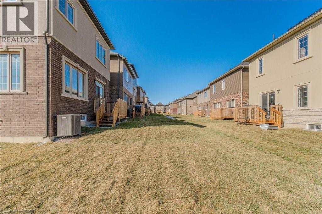 View of green lawn with a deck - 35 Hitchman Street, Paris, ON - Outdoor