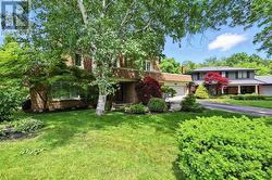 A Picturesque Tree-Lined Street in Shoreacres! -
