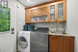 Well-Equipped Laundry Room with Backyard Access -