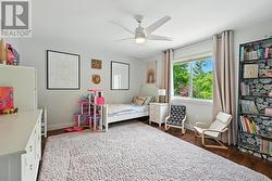 Second Bedroom with Hardwood Flooring -